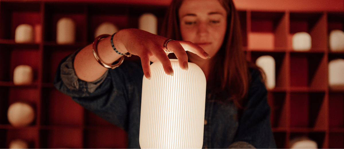 Woman looking at light installation at Interior Design Playground